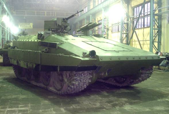 Heavy armored fighting vehicle
made on the basis of the chassis of the tank T-55
